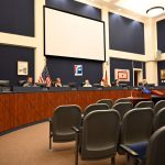 The Flagler County School Board when it last considered a mask mandate, on Aug. 17, after the chamber was cleared when members of the public were deemed to have broken the board's decorum rules. No decision meeting is scheduled until the third week of September unless the board holds an emergency meeting (© FlaglerLive)