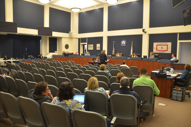 Despite the number of programs on the line for elimination, the school board's meeting room was largely empty as board members went down their list of cuts. (c FlaglerLive)