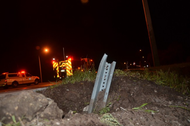 A school crossing sign was sheared off from the base when one of the victims struck it. Click on the image for larger view. (© FlaglerLive)