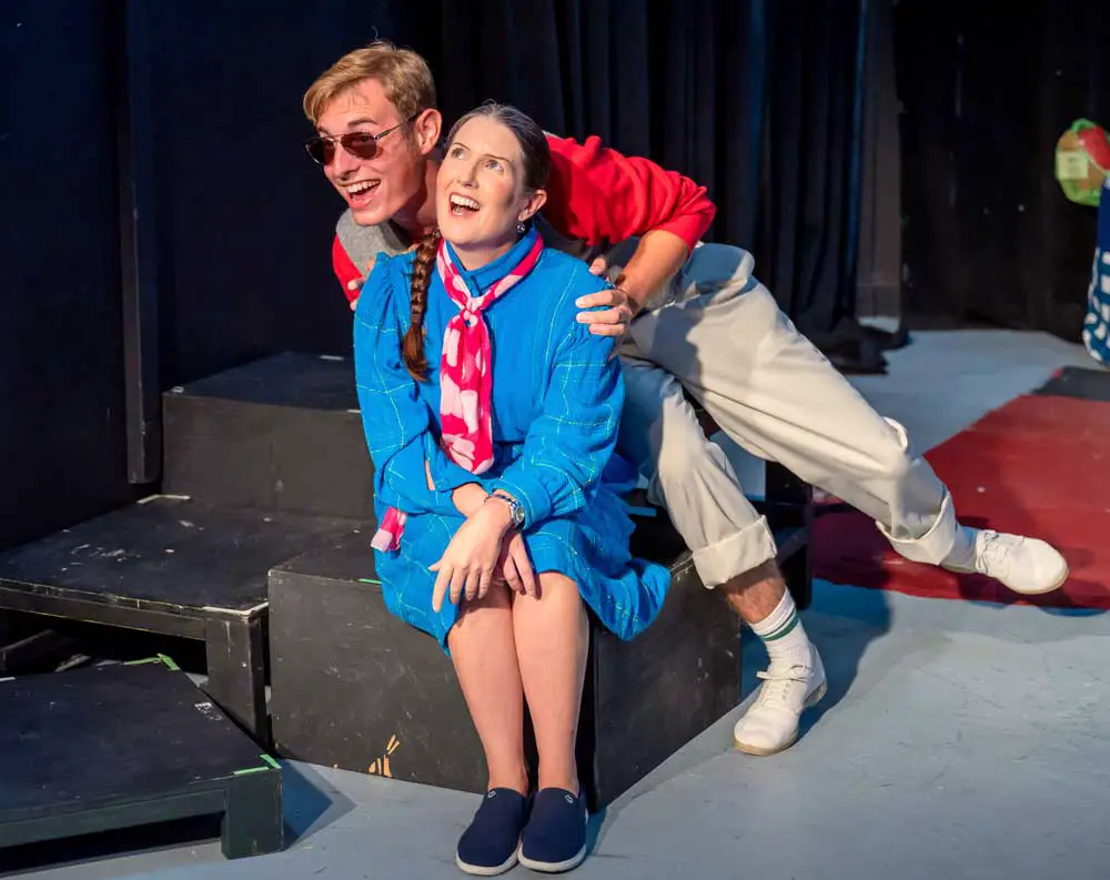 Teacher Jan, played by Junine Johnson, gets help preparing for her first day of class from schoolhouse rocker Michael Sheehan in the City Repertory Theatre production of “Schoolhouse Rock Live! Jr.” (Mike Kitaif)