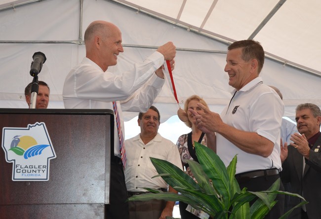 gov. rick scott aveo engineering flagler