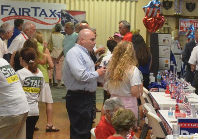 Judge Scott DuPont, center, at a tea party elections forum in 2016 in Palm Coast. He faces a series of charges relating to his conduct on the campaign trail and in the courtroom in a case to be decided sometime in the next two months. (© FlaglerLive)