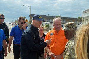 Gov. Rick Scott in Flagler Beach last week, with City Manager Larry Newsom. (© FlaglerLive)