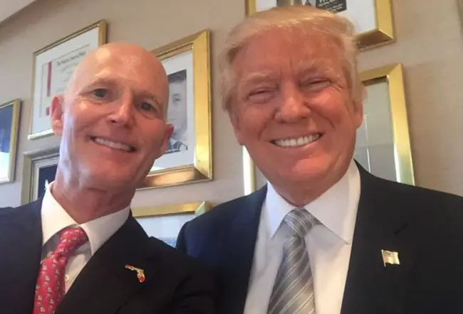 The selfie boys: Rick Scott and Donald Trump just before Trump became president.