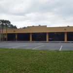 What used to be the Sears building, now a Christian church, on Palm Coast Parkway. (© FlaglerLive)