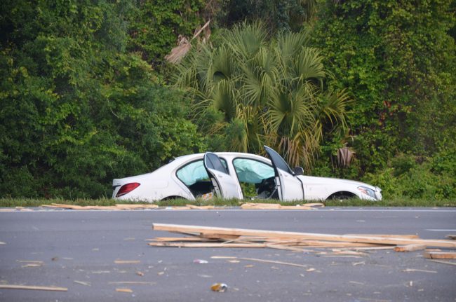 The sedan, which appeared to have no signs of a collision with the truck. (© FlaglerLive)