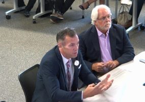 Chris Seilkop, left, and John Walsh today. (© FlaglerLive via Flagler Schools YouTube)