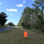 Seminole Woods Boulevard along the proposed boundary of the Cascades development in Seminole Woods. (© FlaglerLive)