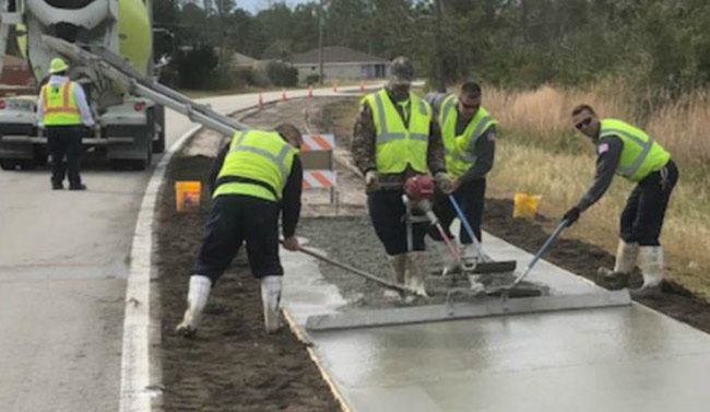 Palm Coast city crews poured concrete on a new pathway along Sesame Boulevard last week. (Palm Coast)