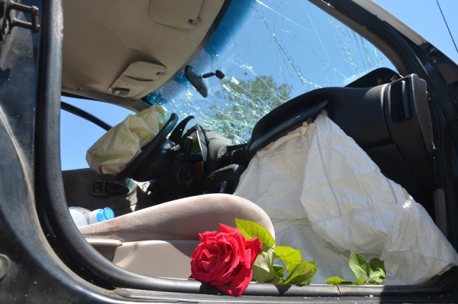 A fresh rose was in the victim's car. Click on the image for larger view. (© FlaglerLive)