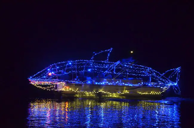 A boat decorated as a shark during last Saturday's  Holiday Boat Parade in Palm Coast. (c FlaglerLive)