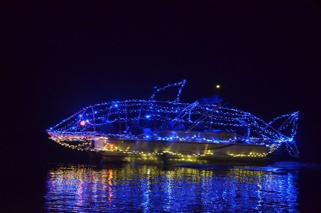 A boat decorated as a shark during last Saturday's  Holiday Boat Parade in Palm Coast. (c FlaglerLive)