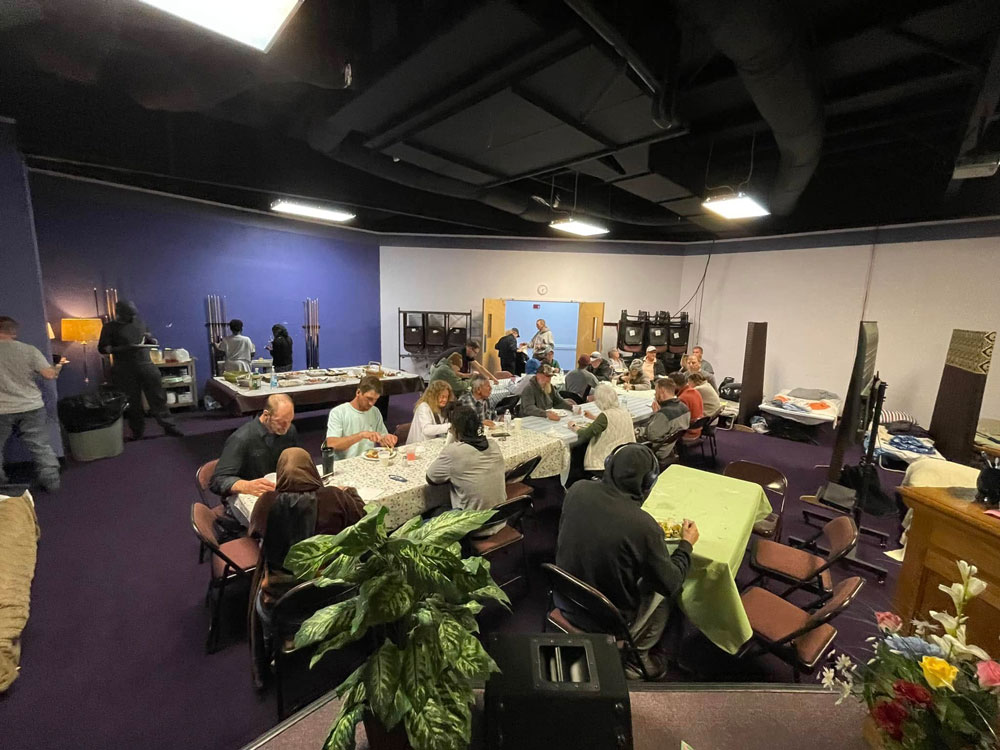 Dinner during a recent evening at the shelter. (The Sheltering Tree)