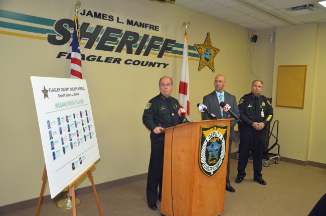 Sheriff Jim Manfre, with Lt. Chris Seppe and Undersheriff Rick Staly, speaking of 'Operation Spring Cleaning' at a lightly attended news conference Tuesday. Click on the image for larger view. (© FlaglerLive)