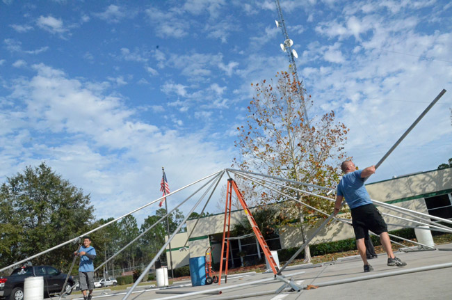 Preparations outside the sheriff's office for Tuesday's swearing in of Jim Manfre went on Monday afternoon, as Manfre's team was announcing major changes to agency ranks. (© FlaglerLive)