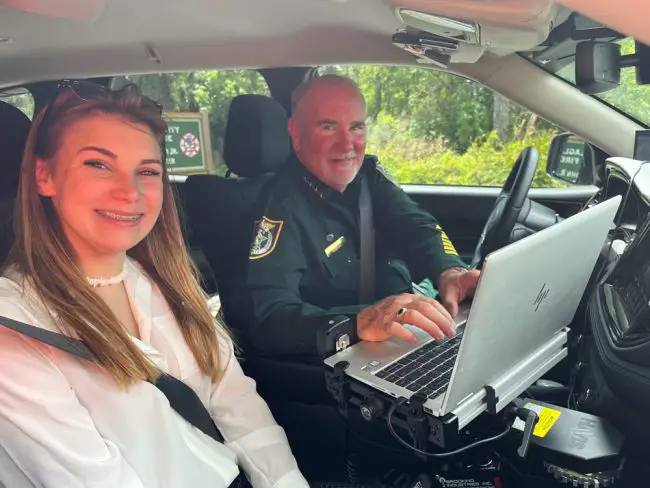 Sheriff Rick Staly and Kadance Nickmeyer during the ride-along. (FCSO)