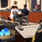 A Flagler County Sheriff's deputy at a recent School Board meeting. (© FlaglerLive)