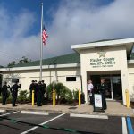 Sheriff Rick Staly, by the [podium, during the flag-raising in front of the Sheriff's Office's new Palm Coast Precinct this morning. (© FlaglerLive)