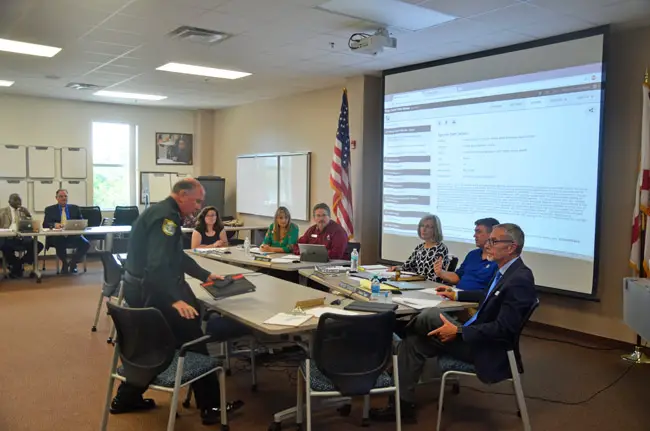 Sheriff Rick Staly sat down for what turned into more of a grilling than he had expected at today's workshop of the Flagler County School Board. (© FlaglerLive)