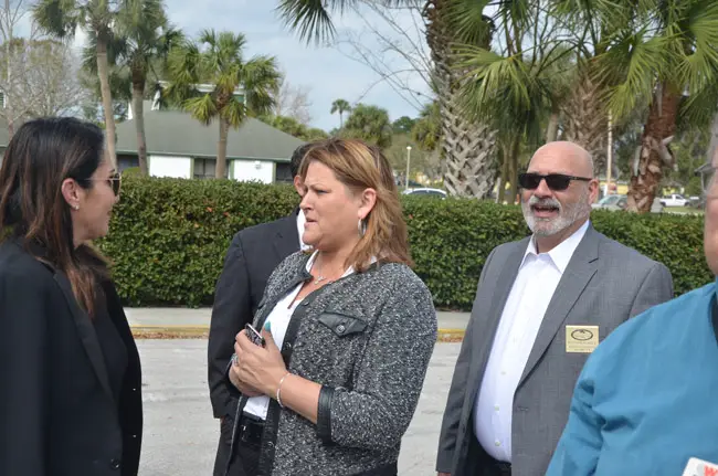 Palm Coast City Council members Heidi Shipley, center, and Steven Nobile, right, had previously seen their efforts for a charter review scuttled by inaction. This time, they're getting a more receptive ear, including from Mayor Milissa Holland, left, though the process will still be controlled by the council at every step. (© FlaglerLive)