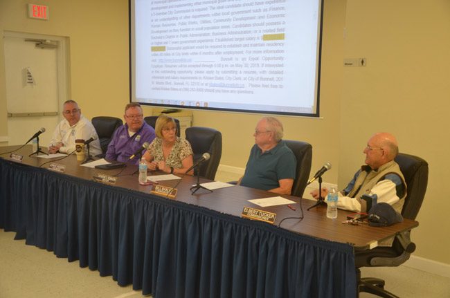 The Bunnell City Commission drew up its shortlist of candidates for city manager outside of an official meeting. From left, John Sowell, John Rogers, Mayor Catherine Robinson, Bill Baxley and Elbert Tucker. (© FlaglerLive)