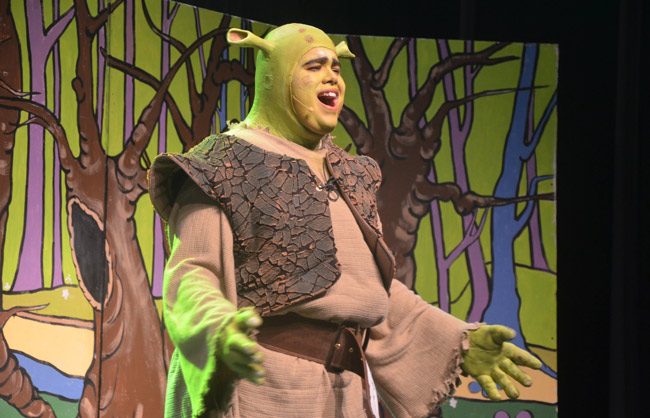 Rafael Soto is Shrek in Matanzas High School's stage production of 'Shrek: the Musical,' opening this evening for a four-day engagement at Pirates Theater at Matanzas. See below for details and tickets. (© FlaglerLive)