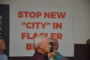 Marshall Shupe was one of two Flagler Beach City Commission members in attendance. Eric Cooley was the other. (© FlaglerLive)