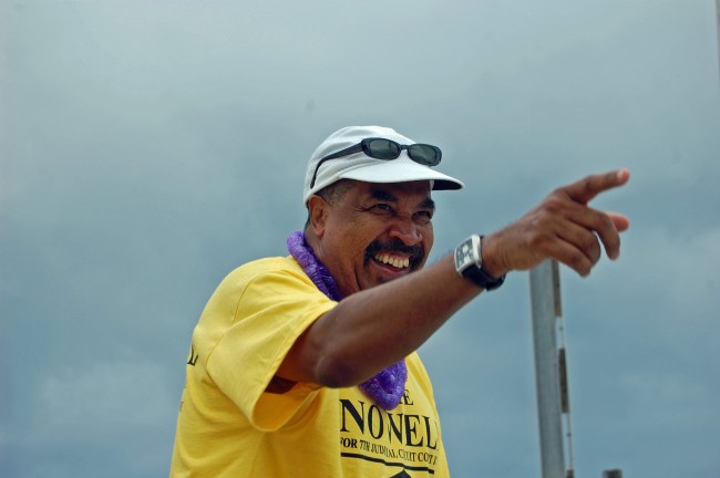 Sid Nowell during the 2010 Flagler Beach July 4 parade, when he was running for a circuit court judge seat. Click on the image for larger view. (© FlaglerLive)