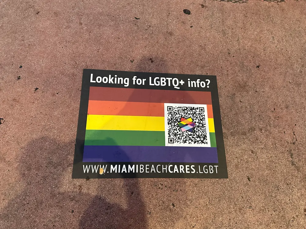 A decal on a Miami Beach sidewalk produced by Miami Beach Cares. (© FlaglerLive)