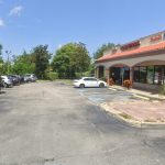 The parking lot a Smiles and other businesses on Palm Harbor Way.