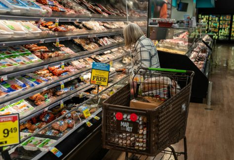 A shopper looks at a meat display at a supermarket. Some 42 million Americans rely on SNAP benefits to put food on the table. Robert Nickelsberg/Getty Images News