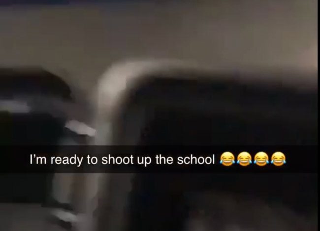Snapchat stupidity: a screen capture from the video the student posted,  showing ammunition and what appeared to be loaded rifle magazines. 