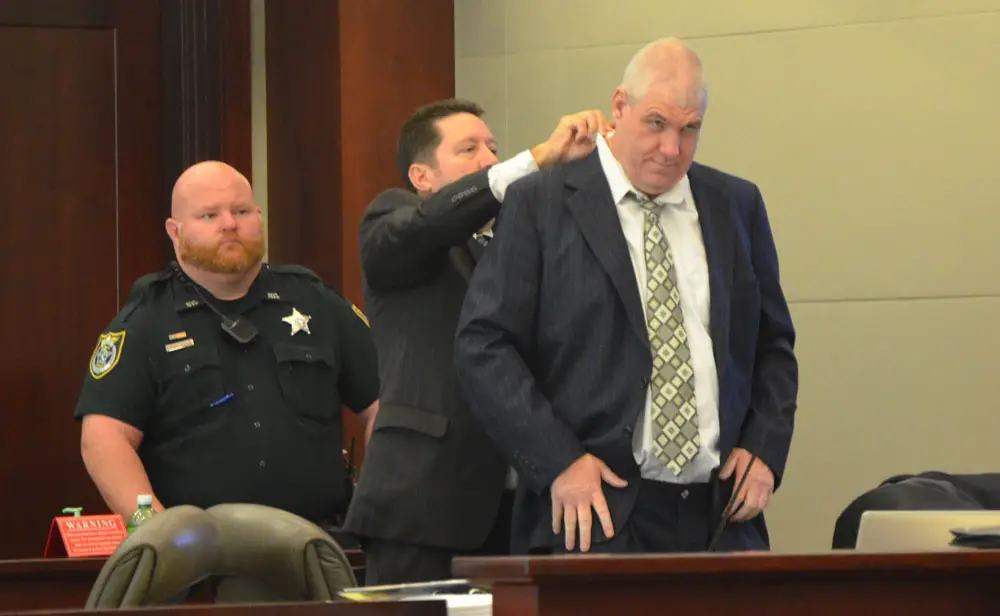David Snelgrove getting prepared for today's trial--his third penalty phase on two murder convictions dating back two decades--with his attorney, Michael Nielsen. (© FlaglerLive)