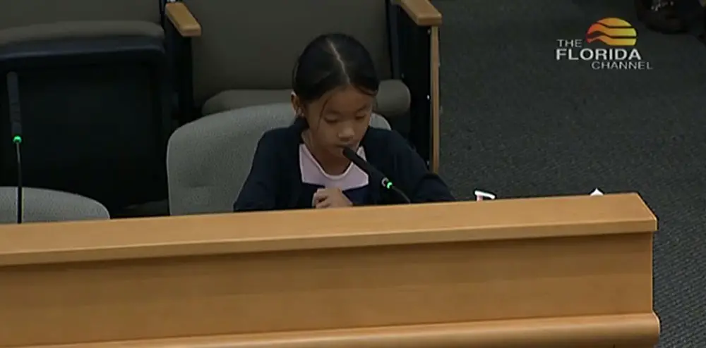 Eight-year-old Manman Chen testified before the House State Affairs Committee on April 19, 2023 (Florida Channel).