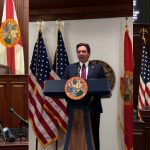 Senate President Ben Albritton, left, Speaker Daniel Perez, left, and Gov. Ron DeSantis, center. (Photos by Jay Waagmeester/Florida Phoenix)