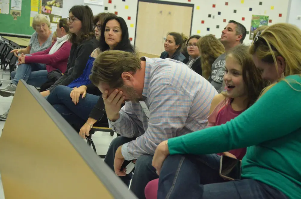 Yes, it's spelling bee time: the countywide spelling bee is at Wadsworth Elementary's cafeteria this evening. See details below. Above, Josh Davis, the local attorney, agonizing during last year's finals as his daughter Addison spelled round after round: she won. (© FlaglerLive)