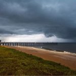 The storm sweeping out of the area, as captured by Flagler Beach photographer and attorney Scott Spradley this morning.
