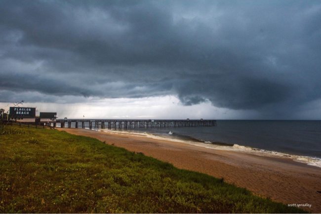 The storm sweeping out of the area, as captured by Flagler Beach photographer and attorney Scott Spradley this morning.
