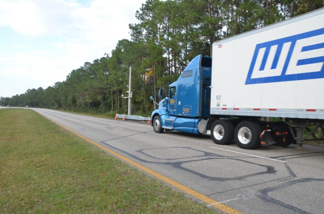 The cameras are triggered by sensors in the road, which are calibrated to go off only when activated by certain weights. Click on the image for larger view. (© FlaglerLive)