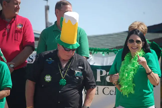 That was St. Patrick's Day: Then-Palm Coast Mayor John Netts and future Pal Coast Mayor Milissa Holland at a Flagler Beach celebration in 2011. (© FlaglerLive)