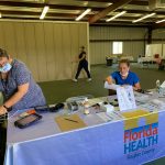 Flagler Health Department staffers setting up a new covid-19 testing location at Cattleman's Hall at the county fairgrounds earlier this week. The location is open three days a week, six hours a day. (DOH)
