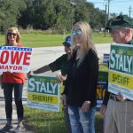 Proximity is not endorsement: Sheriff Rick Staly, with his wife Debbie, had briefly stopped to campaign at the VFW voting precinct off Old Kings Road on Election day in 2020, when an Alan Lowe campaign volunteer was also campaigning--at the time, for mayor. Staly has never endorsed Lowe, and said today he was not endorsing anyone in the Palm Coast council races. (© FlaglerLive)