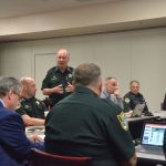 Sheriff Rick Staly meeting with his top staff and other law enforcement officials last May. Coronavirus has created a slew of new and uncharted challenges as the sheriff now has two of his deputies on self-quarantine. (© FlaglerLive)