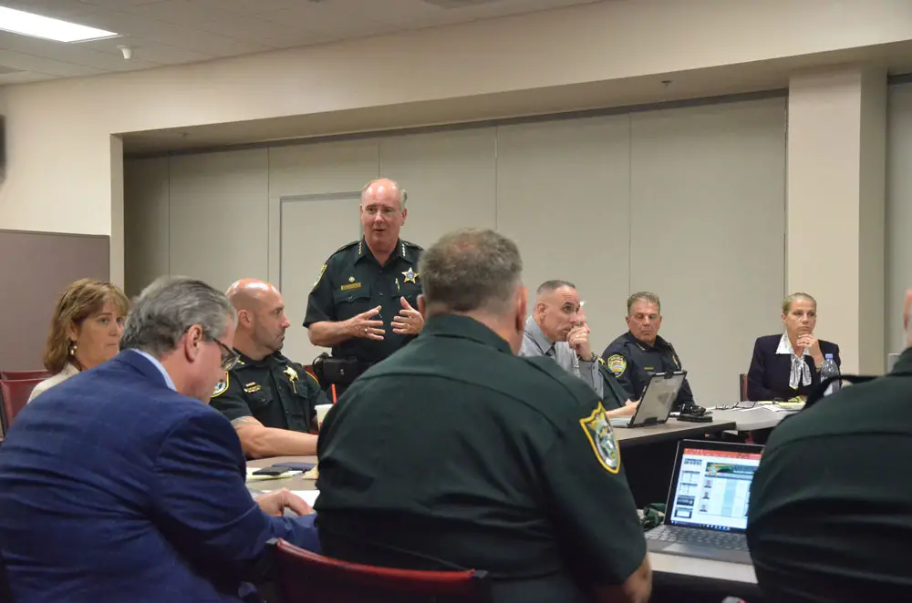 Sheriff Rick Staly meeting with his top staff and other law enforcement officials last May. Coronavirus has created a slew of new and uncharted challenges as the sheriff now has two of his deputies on self-quarantine. (© FlaglerLive)