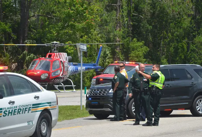 Sheriff Rick Staly and deputies at a crash scene on U.S. 1 on May 24. (© FlaglerLive)