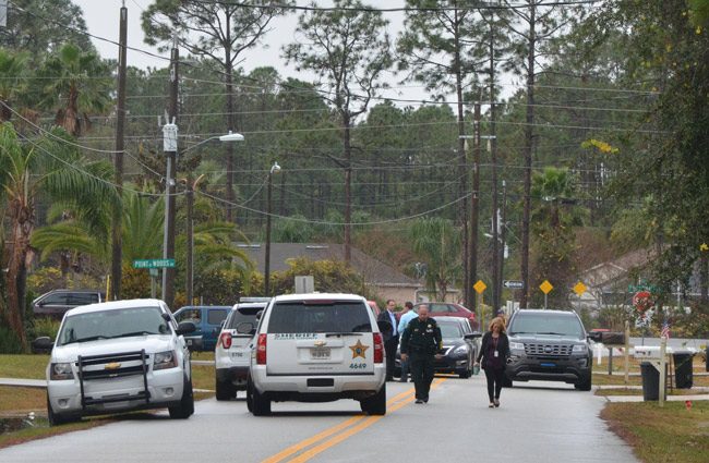 Sheriff Rick Staly and Brittany Kershaw, the sheriff's public information officer, were at the scene of a death the sheriff was considering suspicious this morning on Point Pleasant Drive in Palm Coast. (© FlaglerLive)