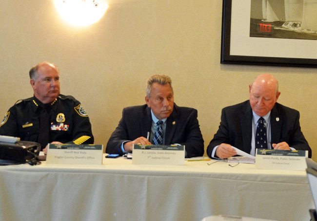 Odd mis-alignment: State Attorney R. J. Larizza, center, and Public Defender Jim Purdy, right, had both supported a Flagler County proposal to de-criminalize the possession of small amounts of pot in some circumstances, for first-time offenders, but Sheriff Rick Staly, left, largely opposed the measure, as did police chiefs in Bunnell and Flagler Beach. So it finally failed. (c FlaglerLive)