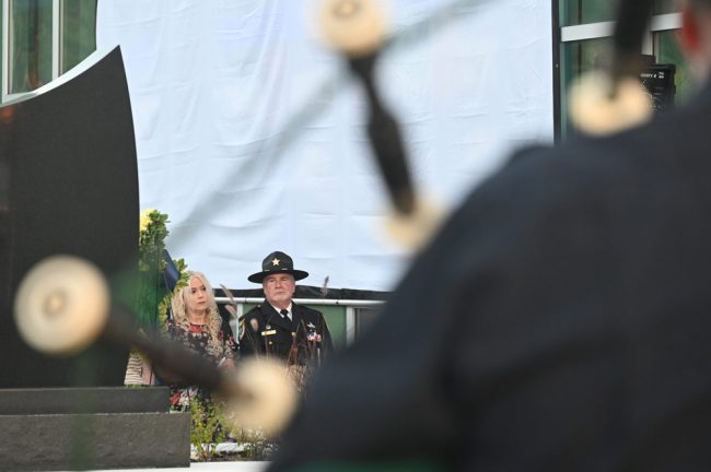 Sheriff Rick Staly and his wife Debbie at the memorial, which included performances by Coastal Florida Police and Fire Pipes and Drums. (© FlaglerLive)