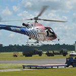 Flagler County Fire Flight, the emergency helicopter, wa splaced on standby Sunday in anticipation of responding to the supposed shooting of a woman in the head. The call turned out to be a prank. (© FlaglerLive)