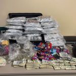 Drugs and cash seized. (FCSO)